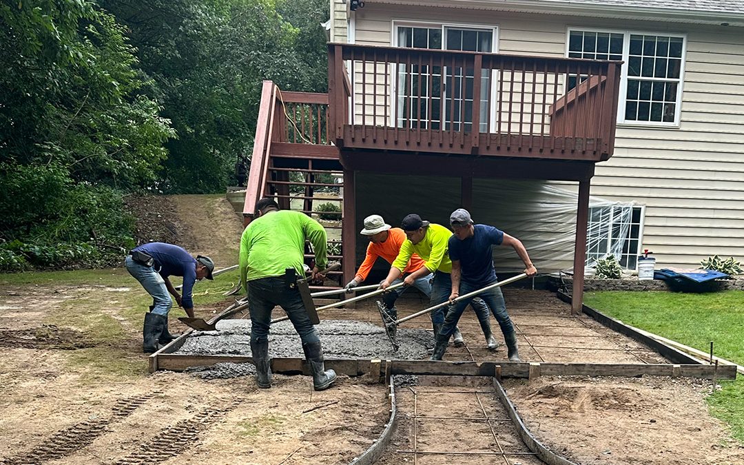 OAX Construction team at work on a patio project